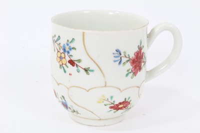 Lot 105 - Worcester coffee cup, circa 1770, painted with flowers with wavy gilt borders, 5.75cm high
