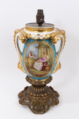 Lot 110 - Good Sèvres style porcelain lamp, standing on an ormolu base, the lamp decorated with figural scenes on a blue and gilt ground, total height 44cm