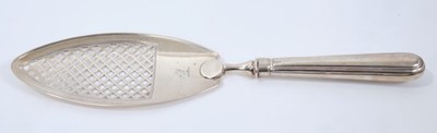 Lot 478 - George III silver fish slice with pierced latticework blade and engraved armorial crest