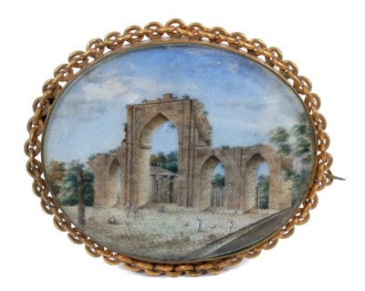 Lot 854 - 19th century Indian miniature watercolour set as a brooch in yellow metal mount