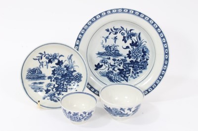 Lot 182 - A Worcester Fence pattern stand for a butter tub, two blue printed tea bowls and a saucer (the saucer with rare 'Man in the Moon' mark)