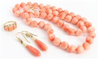 Lot 3299 - 'Angel skin' coral bead necklace with gold...