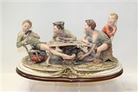 Lot 1082 - Large Capodimonte figure group of young card...