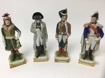 Lot 1160 - Four Continental porcelain military figures, 26cm high, impressed details to bases and marked Made in GDR'