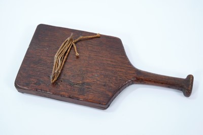 Lot 1942 - Rare 18th century child's horn book, inscribed with the Lord's Prayer, the thin sheet of horn held in place with black metal surround, on a wooden bat-shaped frame with T-shaped handle and engraved...
