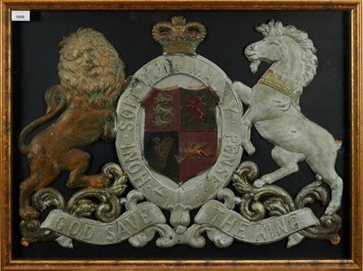 Lot 1956 - Unusual embossed and painted leather panel depicting the coat of arms, with 'God save the King', framed and glazed, the frame measuring 57cm x 76cm