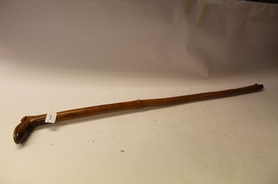 Lot 2717 - Late 19th / early 20th century Holly walking cane with carved handle in the form of a boot, 100.5cm in length
