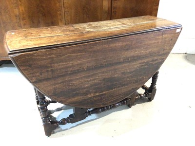 Lot 1373 - 18th century oak drop leaf table