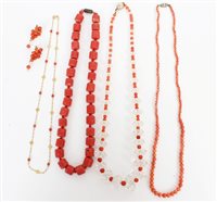 Lot 3305 - Gold (18ct) chain interspaced with coral beads...