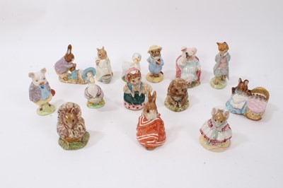 Lot 1124 - Collection of fourteen Beswick Beatrix Potter figures - Little Pig Robinson Spying, Jemima Puddleduck, Hunca Munca, Foxy Whiskered Gentleman, Poorly Peter Rabbit, The Old Woman who lived in a Shoe...