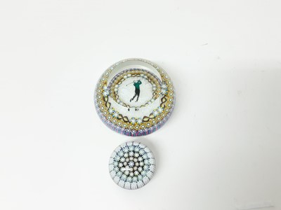 Lot 1130 - Good quality Perthshire Golfer paperweight with millifiori decoration and one other small Perthshire paperweight (2)