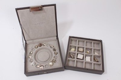 Lot 270 - Collection of silver and white metal charms within a Stackers jewellery box