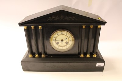 Lot 2427 - Early 20th century black slate mantel clock with columns to case, dial marked September 1903
