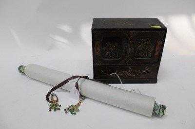 Lot 2386 - Early 20th century Japanese lacquered table cabinet together with a modern scroll (2)