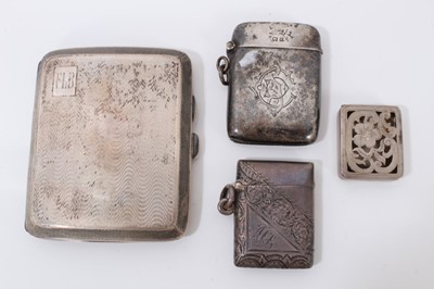 Lot 110 - 1930s silver cigarette case, two silver vesta cases and a silver stamp case (4)