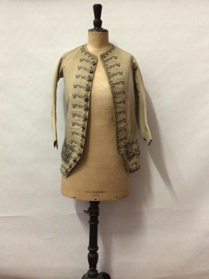 Lot 2051 - Georgian cream wool child's coat with metallic thread embroidery.  Original buttons to front and cuffs and under pocket flaps. Silk interfacings.