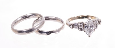 Lot 553 - Diamond single stone ring with a marquise cut diamond weighing approximately 0.97cts. together with a wedding ring