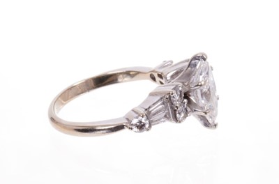 Lot 553 - Diamond single stone ring with a marquise cut diamond weighing approximately 0.97cts. together with a wedding ring