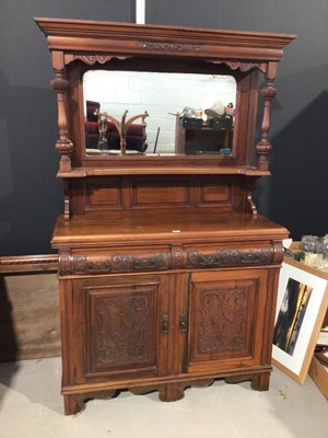 Lot 993 - Edwardian carved walnut two height sideboard with bevelled mirror back H192.5, W124, D46cm