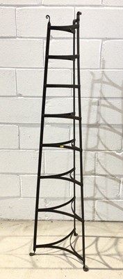 Lot 1008 - Wrought iron eight tier pot stand of triangular form