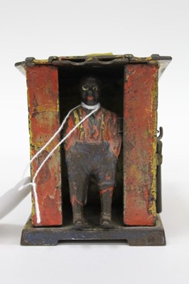 Lot 2362 - Antique novelty pay money box modelled as Uncle Tom's Cabin, patent date of 1885 to base, 9.5cm high