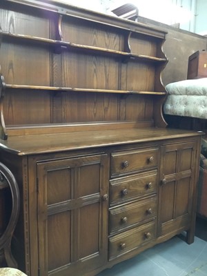 Lot 925 - Ercol elm dresser