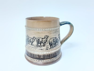 Lot 1173 - Royal Doulton stoneware tankard, decorated with sheep by Hannah Barlow, marks to base