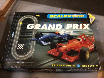Lot 1911 - Scalextric Grand Prix box set, plus additional track and Hornby tank engine, tender, rolling stock and track