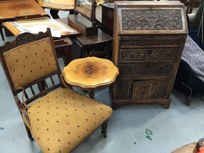 Lot 903 - Late Victorian carved oak bureau with floral carved decoration , Victorian easy chair and occasional table (3)