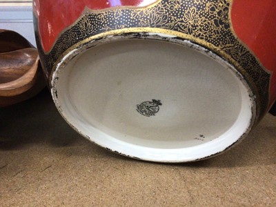 Lot 132 - Carlton Ware jardiniere, decorated with tropical birds on a red and gilt ground
