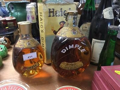 Lot 411 - Two bottles of vintage Dimple whisky, and various bottles of alcohol