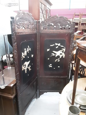 Lot 961 - Late 19th century Japanese two fold screen with lacquered panels and applied carved bone bird and flowers