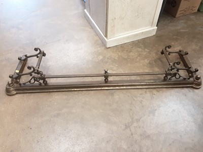 Lot 1038 - Victorian brass fender, 132cm wide