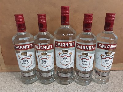 Lot 17 - Four bottles of Smirnoff Vodka 70cl together with a 1 litre bottle (5)