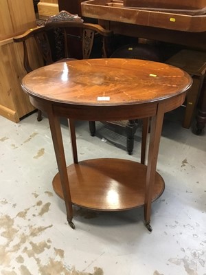 Lot 954 - Edwardian inlaid mahogany oval two tier occasional table on splayed legs and brass castors