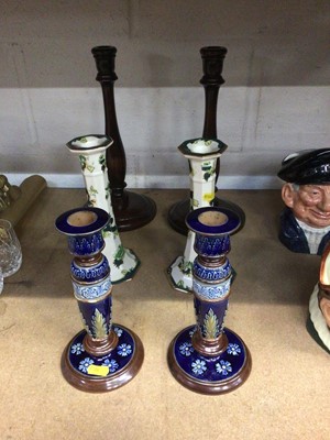 Lot 38 - Pair of Doulton Lambeth candlesticks, pair of Mason's Chartreuse candlesticks, and a pair of turned wood candlesticks (6)