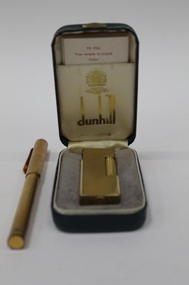 Lot 2456 - Dunhill gold plated lighter in box and Dunhill gold plated fountain pen (2)