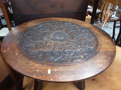 Lot 1098 - Good quality oak coffee table with carved circular top on turned and block legs joined by x frame stretchers, 78cm diameter, 41.5cm high