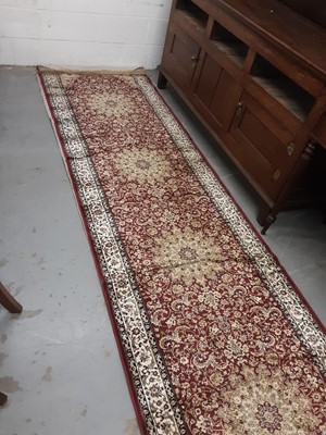 Lot 1152 - Eastern runner on red ground