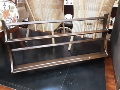 Lot 1125 - Ercol hanging plate rack, 96cm wide, 50cm high