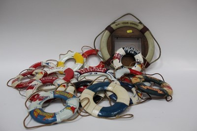 Lot 2397 - Collection of 1960s miniature model lifebuoys commemorating the ships docking in London