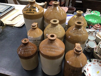 Lot 168 - Collection of nine stoneware flagons, most with Ipswich labels