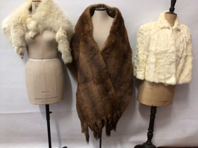 Lot 2091 - Selection of fur items including Arctic fox wrap, a wide Mink stole, cream fur cape with furrier fastenings and a musquash fur coat.