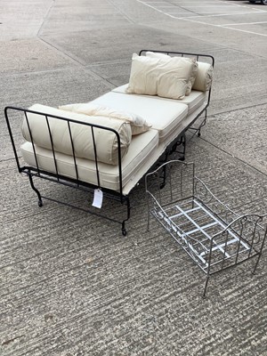 Lot 1195 - Victorian iron framed folding bed and a folding dolls cot (2)