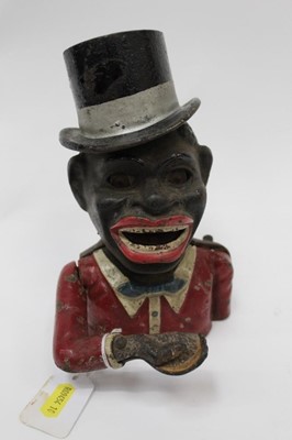 Lot 2475 - Late 19th/early 20th century cast iron Gentleman with Top Hat mechanical money box, with moveable arm, tongue and eyes. Unmarked. 20cm overall height.