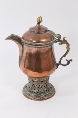 Lot 760 - Middle Eastern copper coffee pot with silvered decoration, raised on a pierced base