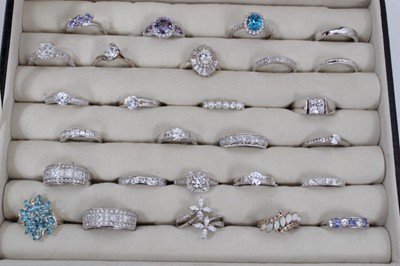 Lot 72 - Ring display box containing twenty seven contemporary silver and gem set dress rings