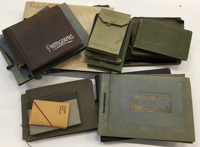 Lot 1561 - Box of various photo albums, 1910-30’s photographs include families, vehicles, sports, album of negatives with vehicles and people.