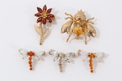 Lot 81 - Five gold gem set novelty brooches