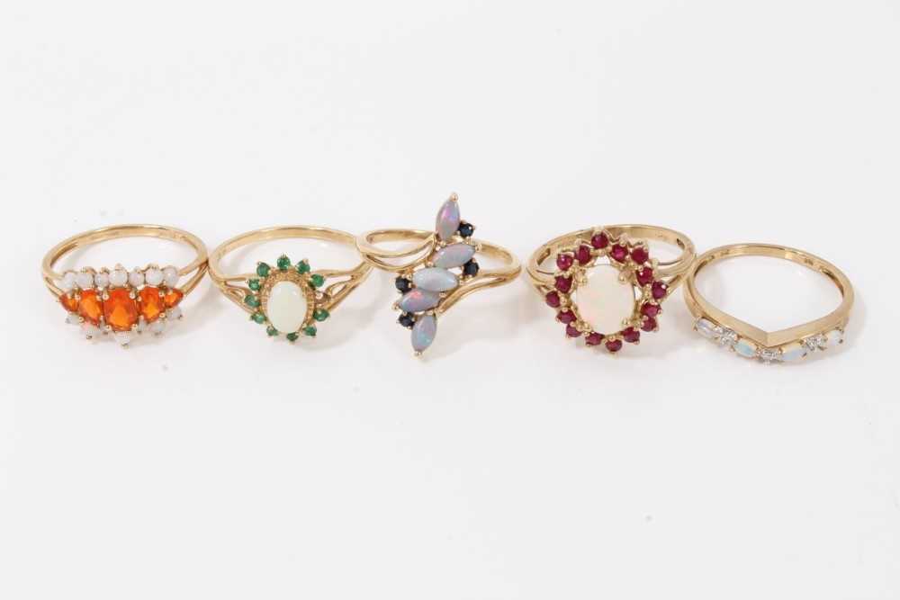 Lot 83 - Five 9ct gold opal and gem set dress rings